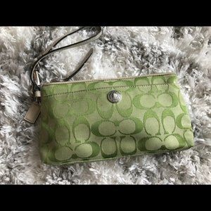 Authentic Coach signature wristlet bag in green